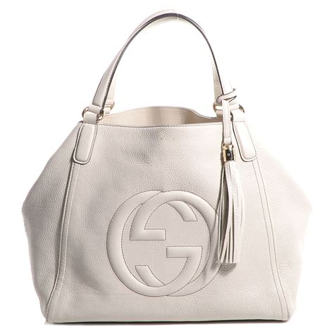 gucci biarritz|white Gucci handbag.